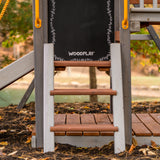 woodplay swingset with chalkboard and ladder