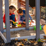 sandbox in playset from woodplay multi level swingset
